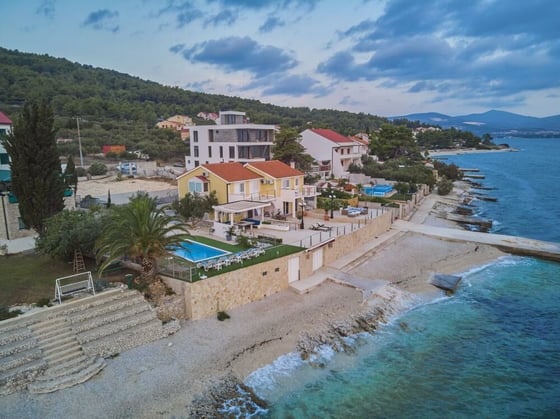 Fascinating beachfront villa with swimming pool and pier on, picture 2